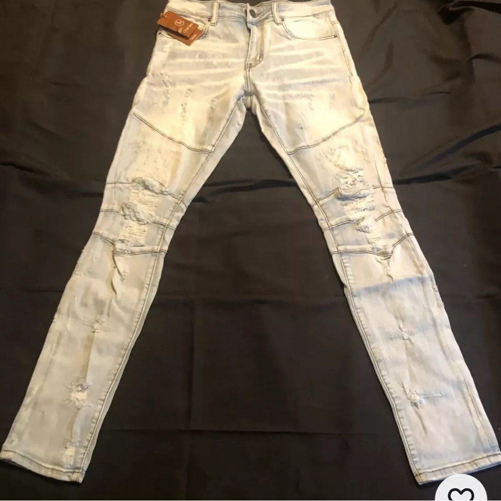 Light Blue Skinny Jeans with Distressing and Vintage Look